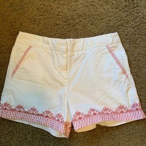 White shorts with dark rose embroidery